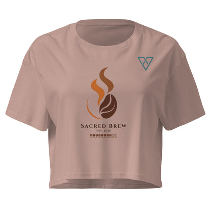 Women's HorizonVibe Sacred Brew coffee crop top in hazy pink, minimalist logo front view on white background