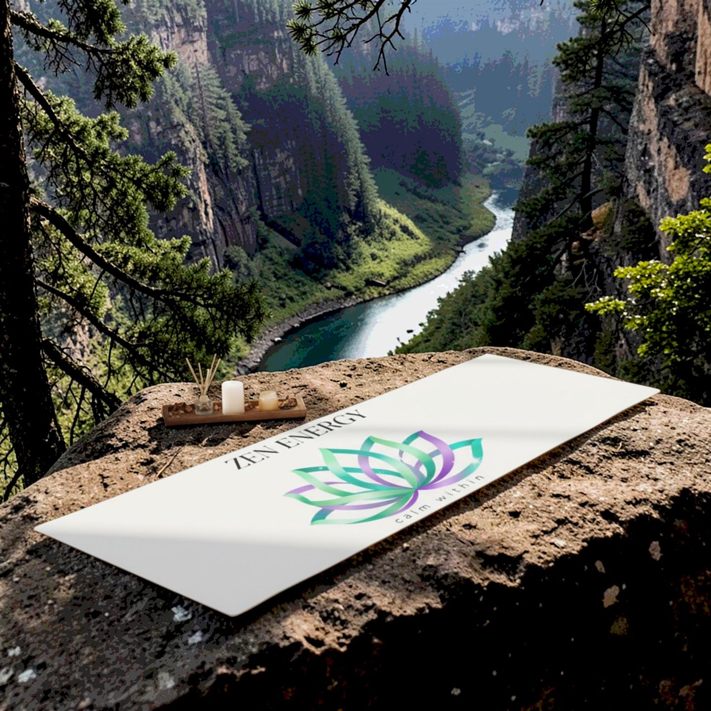 Zen Energy yoga mat with lotus design placed on a rock in nature, outdoor zen setting with river and mountains, HorizonVibe